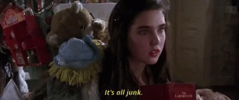 Sarah is laden down with old toys and games. She has an epiphany: "It's all junk!"